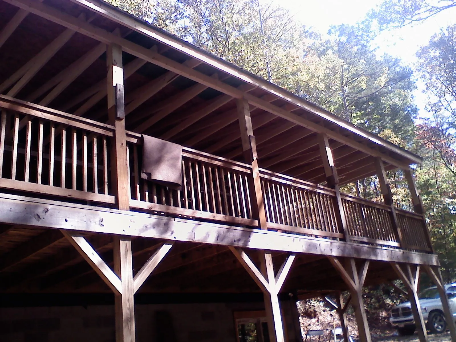 Timber framing under a new elevated porch and deck — Roof Leak Repair in Calhoun by Roofing Brothers